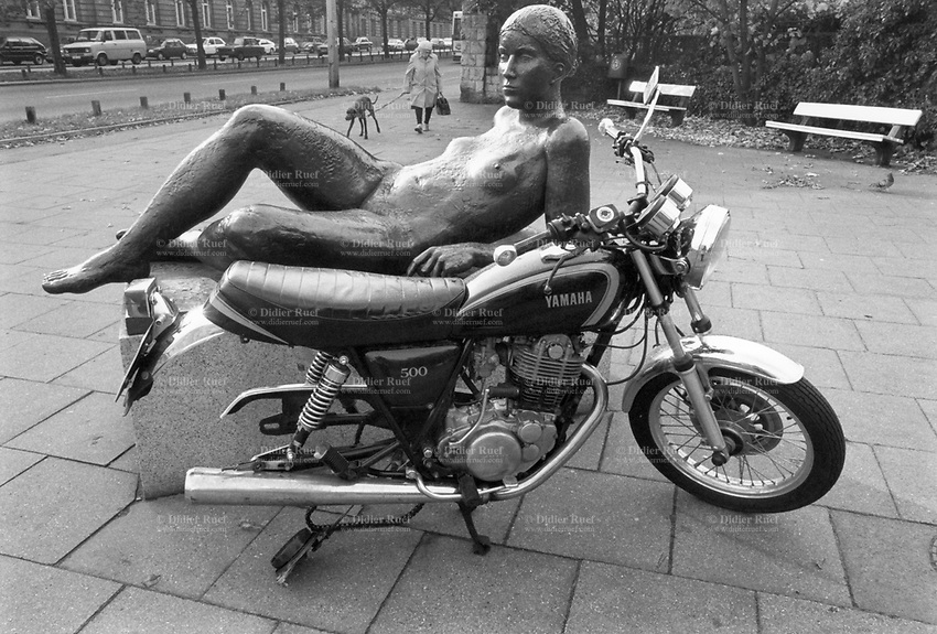 daniel mauck add naked woman on a motorcycle photo