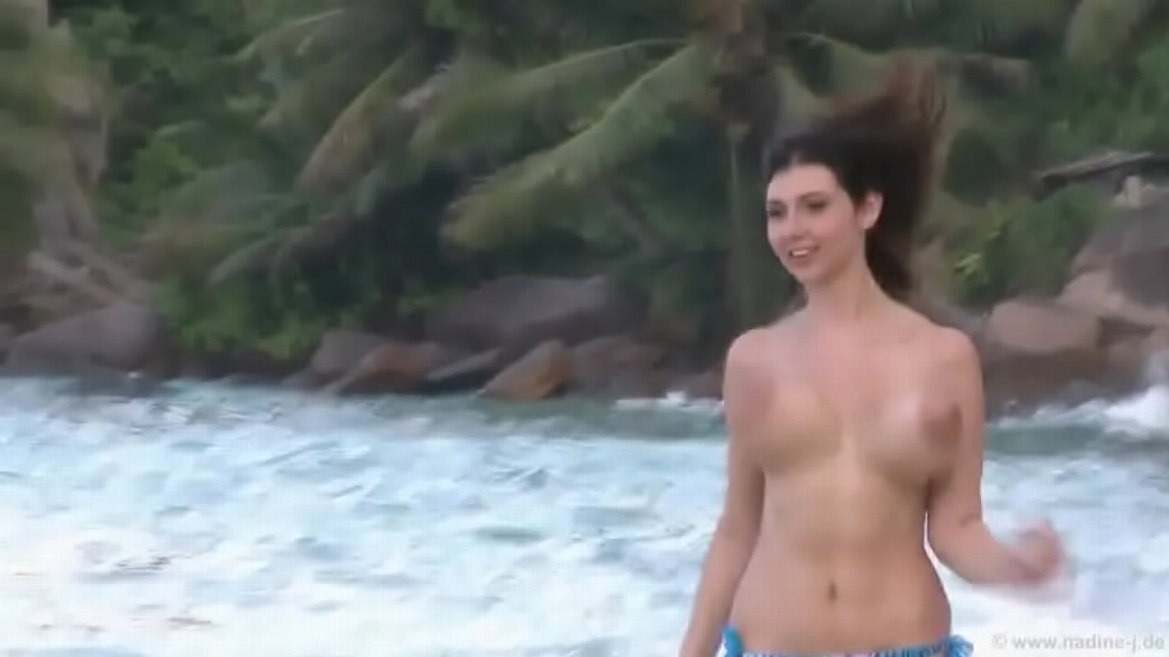 bouncing tits on beach